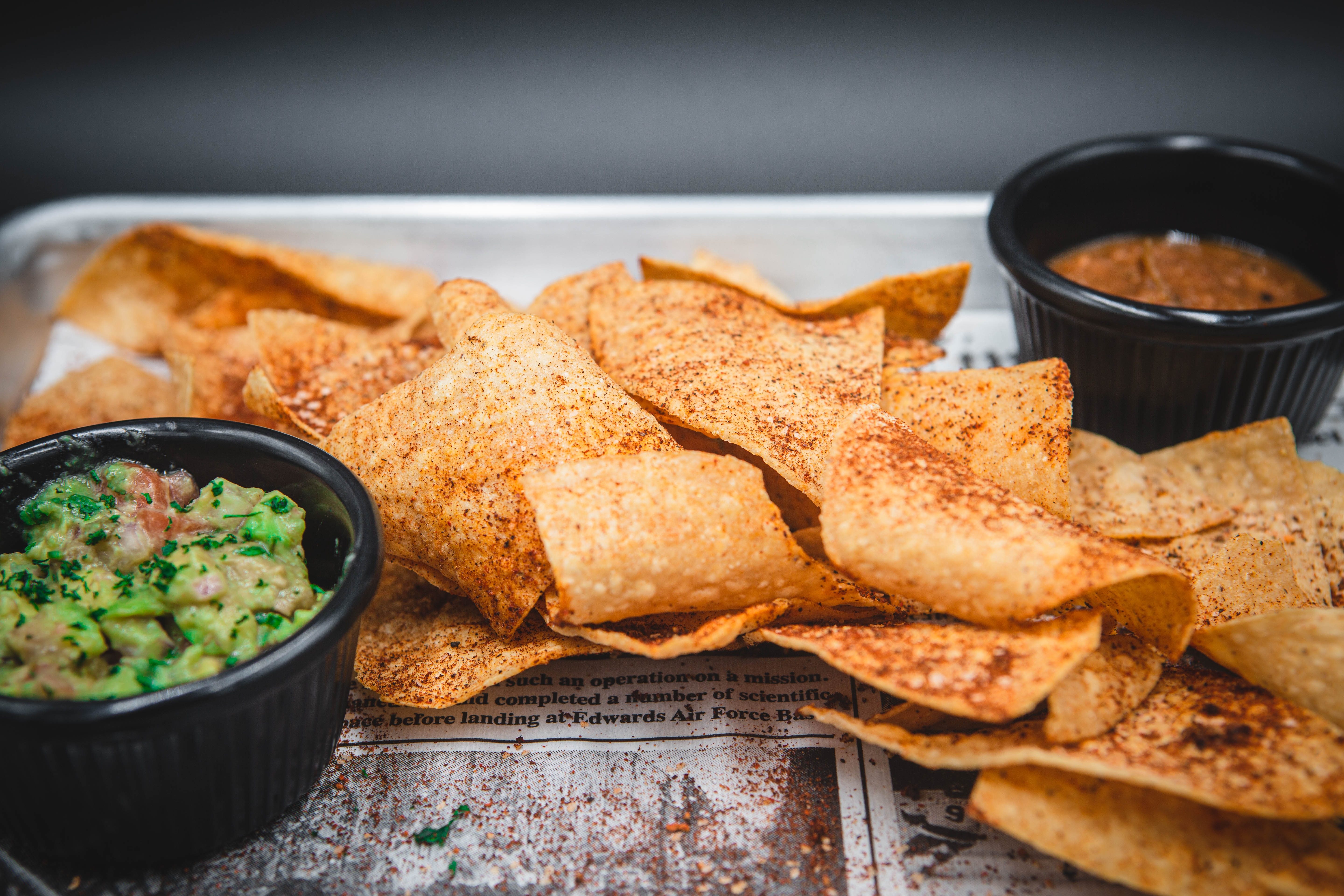 Chip with Queso, Salsa, & Guac.