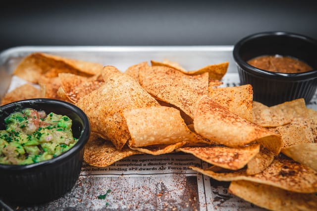 Chip with Queso, Salsa, & Guac.