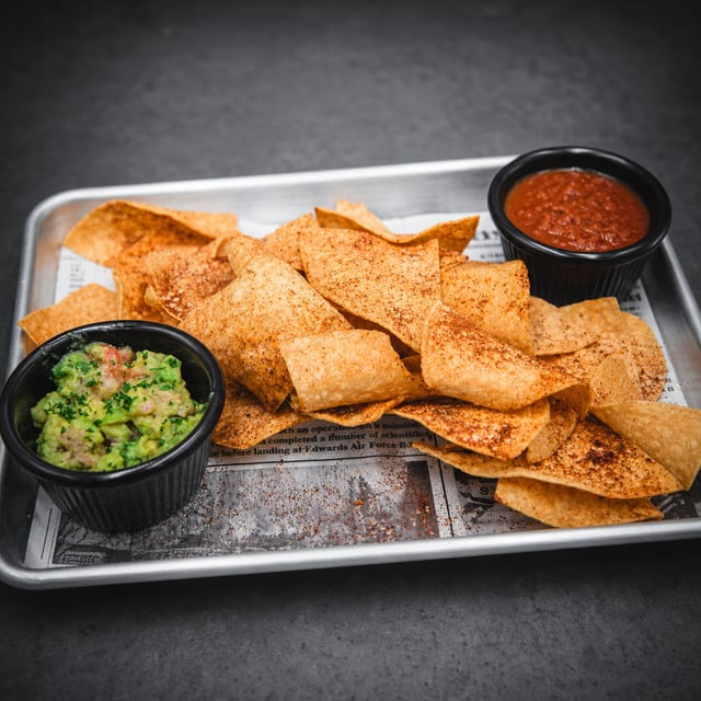 Chip with Queso, Salsa, & Guac.
